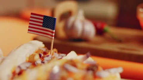 Process of preparing Irresistible chili cheese Hot Dogs. Taste USA cuisine witch Stock Footage 231549573