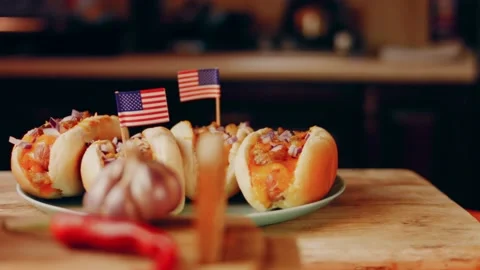 Process of preparing Irresistible chili cheese Hot Dogs. Taste USA cuisine witch Stock Footage 231549719