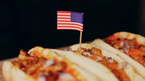 Process of preparing Irresistible chili cheese Hot Dogs. Taste USA cuisine witch Stock Footage 231549869