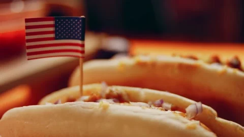 Process of preparing Irresistible chili cheese Hot Dogs. Taste USA cuisine witch Stock Footage 231549913