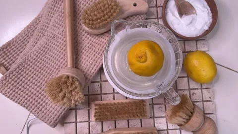 The process of preparing a natural cleaning product with lemons for cleaning the Stock Footage 302197751