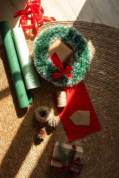 Process of preparing presents for Christmas, decorations. Paper and box with Stock Photos