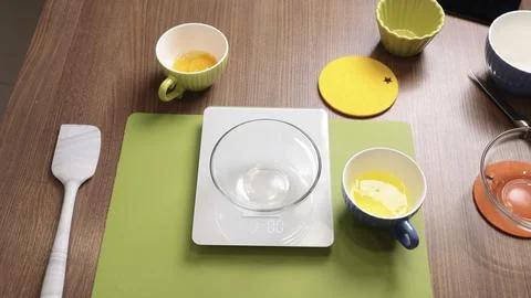 Process of preparing scales and dishes for dough preparation. Objects on wooden Stock Photos