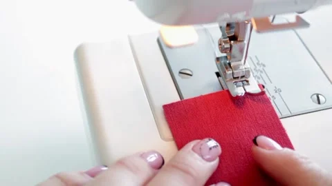 The process of preparing for sewing on a sewing machine. Stock Footage 169751740