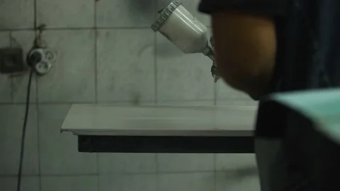 The process of priming the car before applying the paint. Car repair shop. Stock Footage 85072881