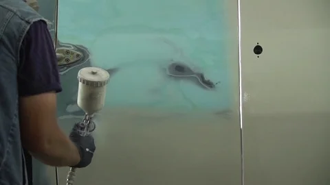 The process of priming the car before applying the paint. Car repair shop. Stock Footage 85074200