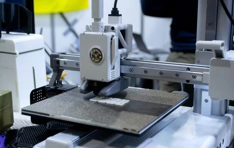Process of printing on 3D printer. 3D printer creating model from molten plastic Stock Photos