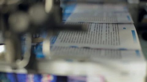 The process of printing booklets at the printing house Stock Footage 43741582