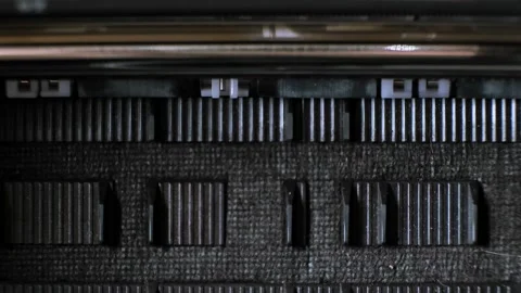 The process of printing a color inkjet printer in close-up. The rolles is Stock Footage 314622001