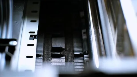 The process of printing a color inkjet printer in close-up. The rolles is Stock Photos