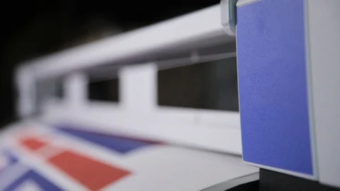 The process of printing on a large format printer. Printing wallpaper on Stock Footage 106762770