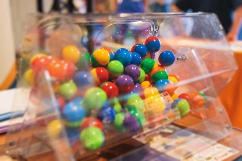 Process of prize drawings, extracting a winning numbers of lottery machine,.. Stock Photos