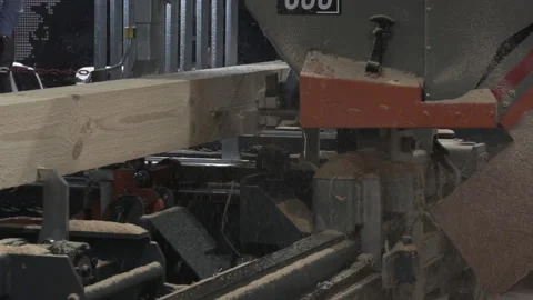 The process of processing logs in sawmill equipment. Sawing logs at sawmill equi Stock Footage 121969048