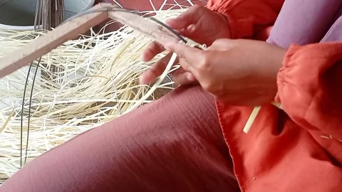 The process of processing raw rattan into woven rattan. Stock Footage 272790195
