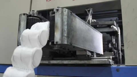 Process producing blocks of dependent springs at mattress factory indoors. Stock-Footage 240757296