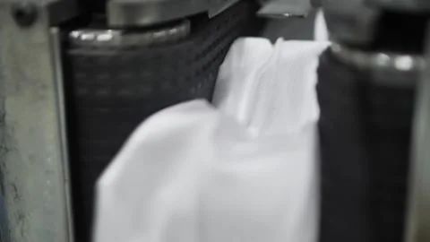 Process producing blocks of dependent springs at mattress factory indoors. Stock-Footage 240757304