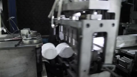 Process producing blocks of dependent springs at mattress factory indoors. Stock-Footage 240757343