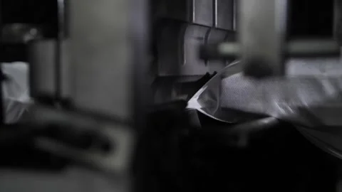 Process producing blocks of dependent springs at mattress factory indoors. Stock-Footage 240757362