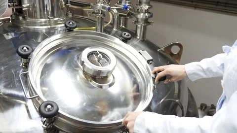 The process of producing a liquid powder for washing. Reactor Stock Footage 107270596