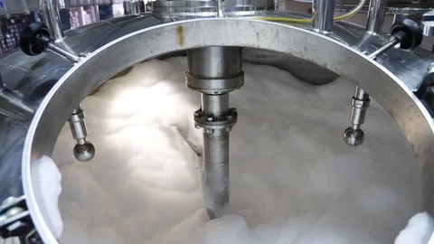The process of producing a liquid powder for washing. Reactor Stock Footage 107270620