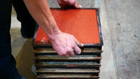 Process of production of red paving tiles. Mini factory. Drying the product. Stock Footage 132156847