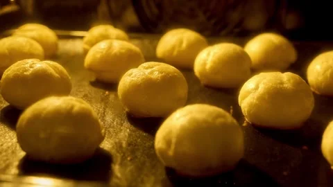 Process of profiterole production. Baking concept. Homemade food. Profiteroles Stockbeeldmateriaal 328017331