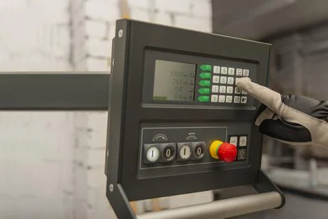 The process of programming a CNC machine. Entering data into a computer contr Foto stock