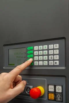 The process of programming a CNC machine. Entering data into a computer contr Foto stock