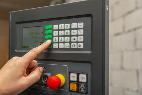 The process of programming a CNC machine. Entering data into a computer contr 写真素材