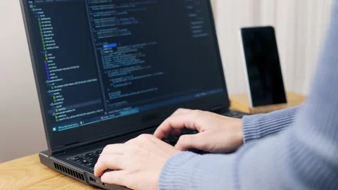 The Process of Programming, Debugging, Writing Script. The Professional Female D Video stock 145581298