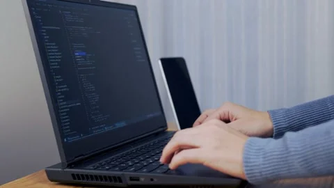 The Process Of Programming, Writing Program Code, Debugging . The Female Develop Stock Footage 144885022