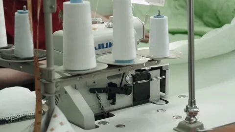 Process of quilting on patchwork blanket close up sewing machine hands 動画素材 85286955