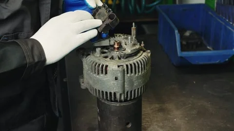 The process of repairing of a car generator in a workshop Stock Footage 284543764
