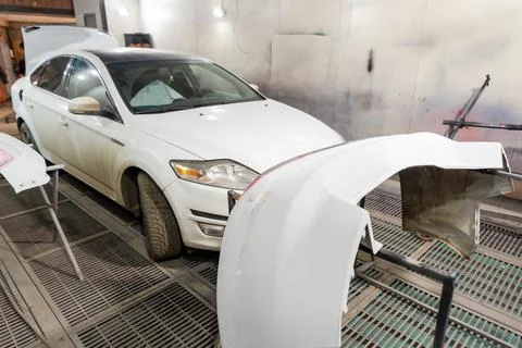 The process of repairing a car in a workshop. Stock Photos