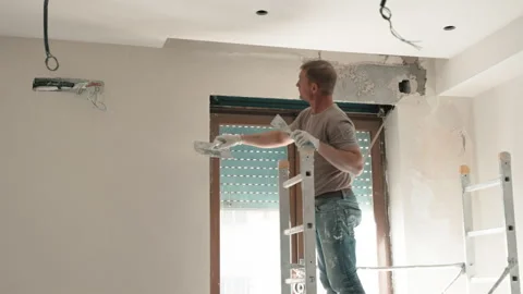 Process of repairing works on construction site in new apartment, building Stockbeeldmateriaal 158157491