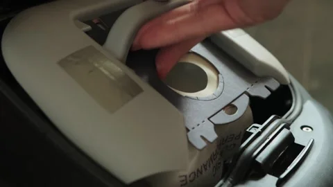 Process of replacing dust bag in vacuum cleaner home appliance. Installation of Stock Footage 336246853