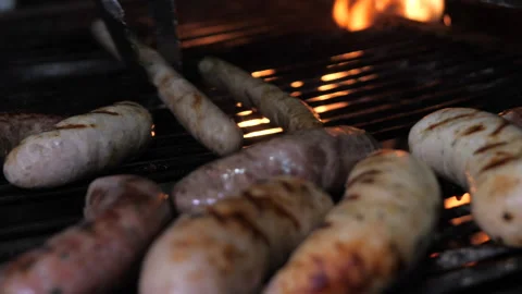 Process of roasting Bavarian sausages on the grill Video stock 144704266