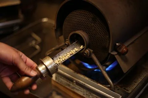 The process of roasting coffee beans Stock Photos
