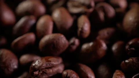 In the process of roasting coffee beans. slow camera approach shot in slow mo Video stock 170865770