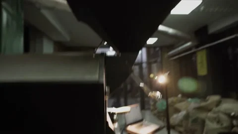 The process of roasting coffee Entrepreneur pouring raw coffee beans into a  Stock Footage 229841920