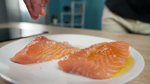 The process of salting salmon steak. Stock Footage 159997286