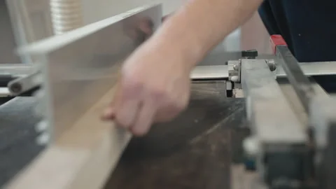 Process of sanding wood plank surface on workbench with special grinding machine Video stock 224659144