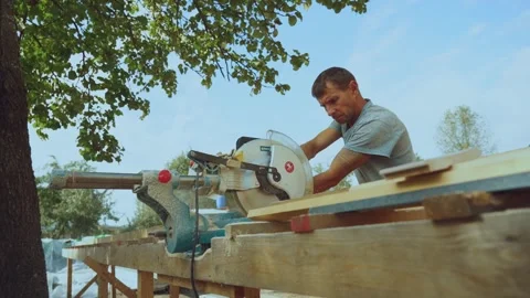 The process of sawing with a circular saw Stock Footage 344696602