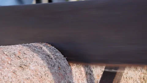 Process of sawing a log with a hand saw Stock Footage 167322663