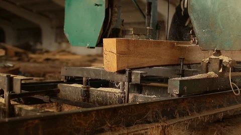 The process of sawing logs at the sawmill. Stock Footage 129081519