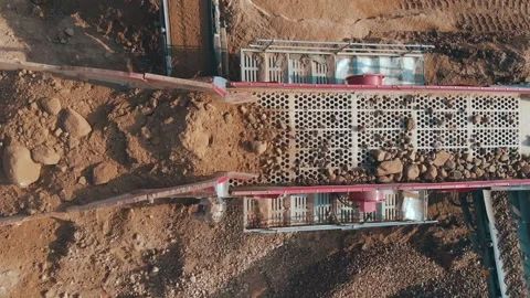 Process of screening and cleaning of sand and gravel with quarry machinery Stock Footage 236945574