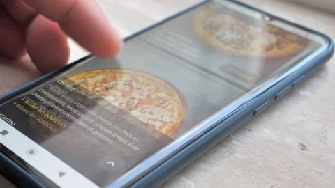 The Process of Selecting and Ordering Takeaway Food Pizza Online in the Mobile Stock Footage 204841835