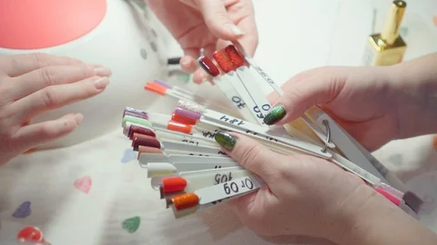 The process of selection of nail polish. Stock Footage 127251039