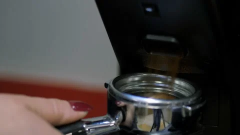 Process of semi-automatic filling of ground coffee beans into a mold for a Stock Footage 194731193
