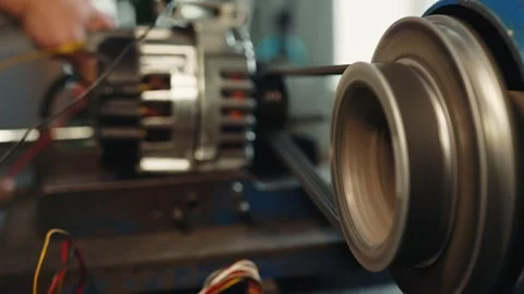 Process of setting up and repairing a car generator power testing Stock Footage 285642730